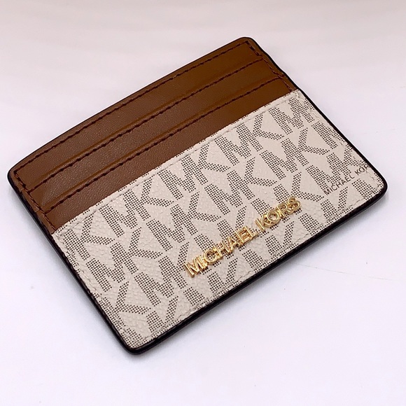MICHAEL KORS
Leather Large Card Holder Case Wallet
vanilla signature color - Picture 6 of 8